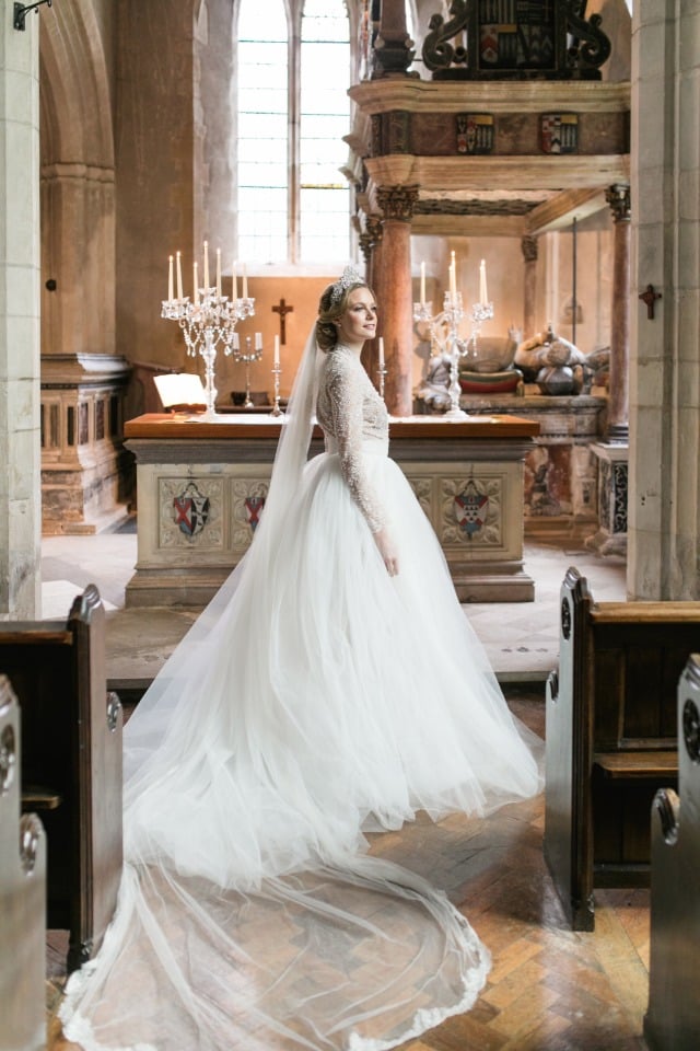 cathedral wedding with a regal wedding gown