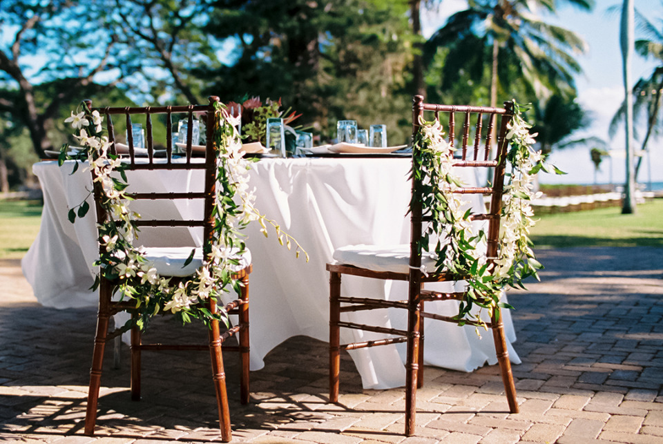 floral garlands for wedding chairs