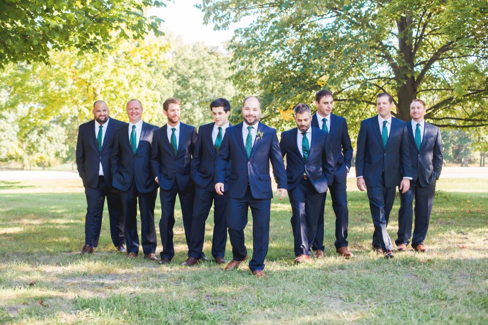 Navy suits and teal ties