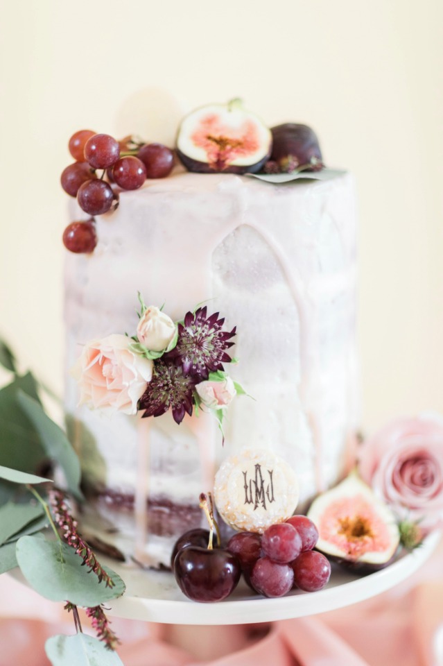 Beautiful sweetheart cake with monogrammed macarons