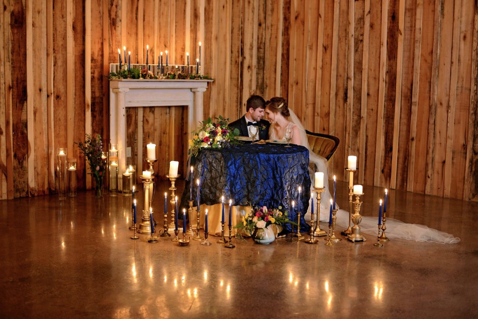 sweetheart table surrounded by candles