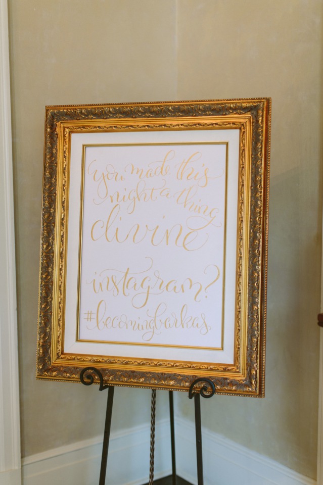 gold framed wedding sign