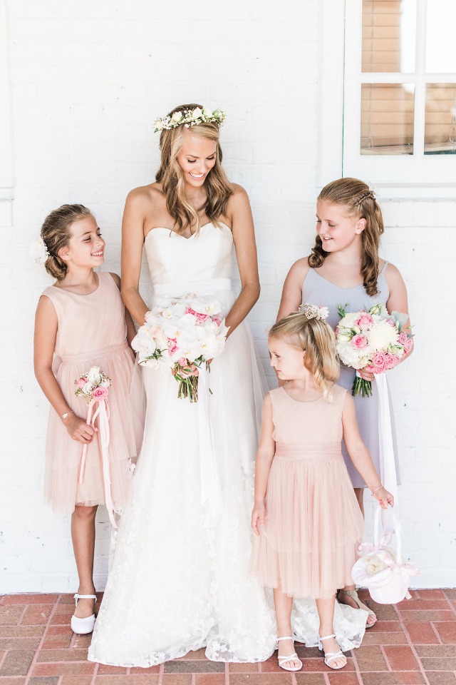 the bride and her flower girls