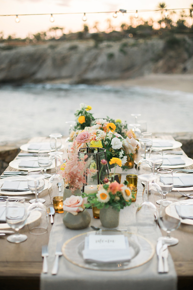 pink yellow and orange wedding reception in Cabo