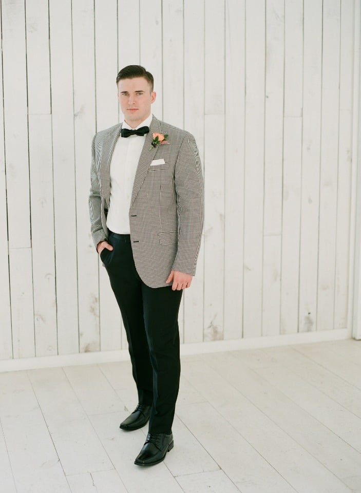 groom in vintage style checkered jacket 
