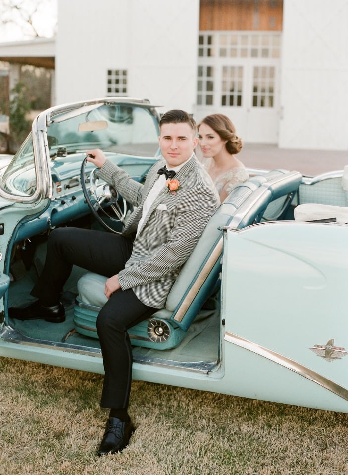 bride and groom and a 54 Buick