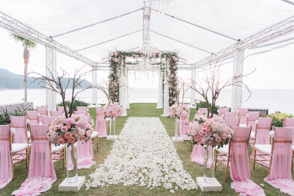 Pink and white wedding ceremony decor