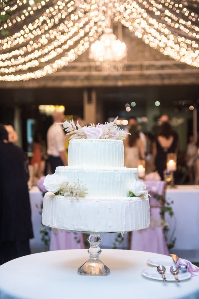 Pretty three tier white wedding cake