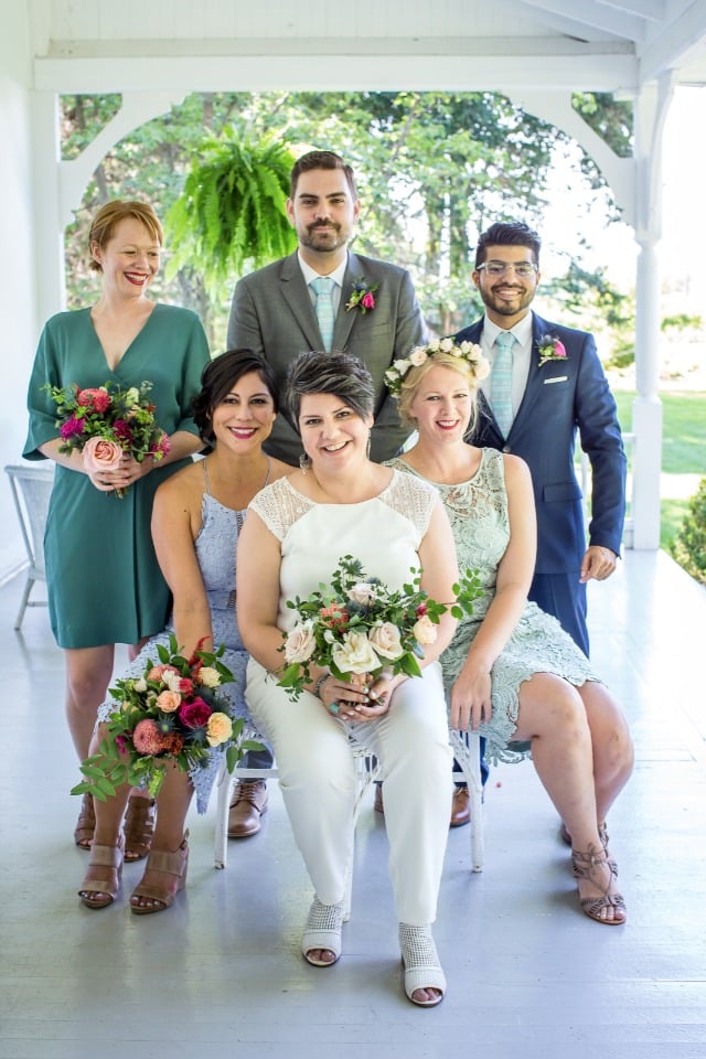 bridal party in blues and greens