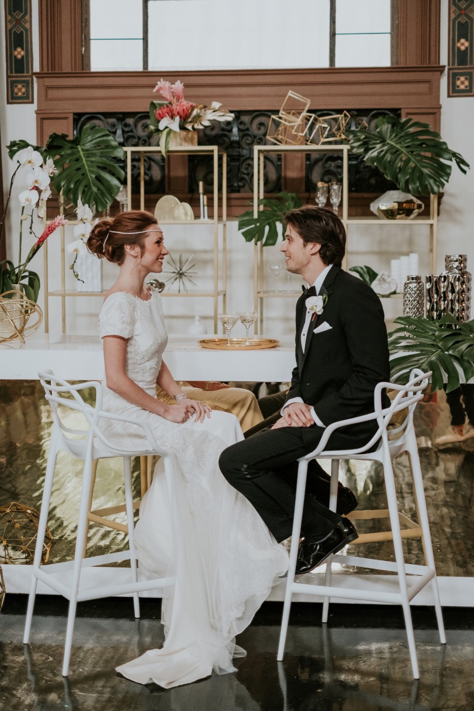 Bride and groom looks at this tropical glam wedding