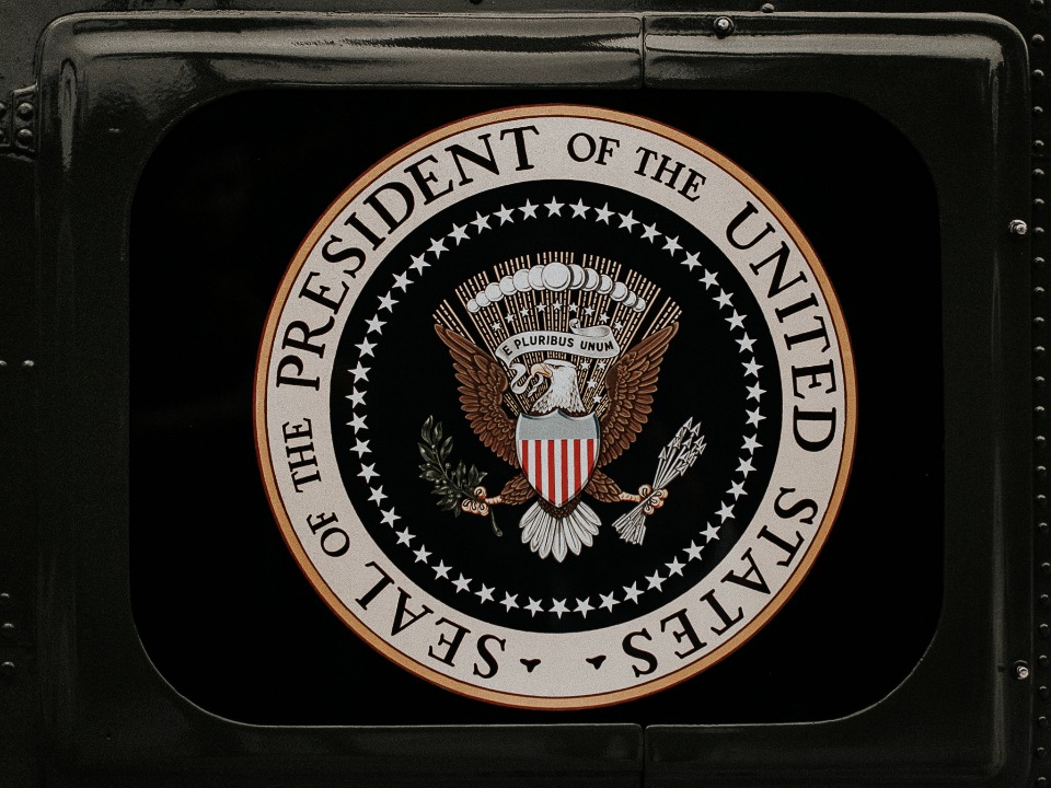 Presidential Seal on a black vehicle detail closeup