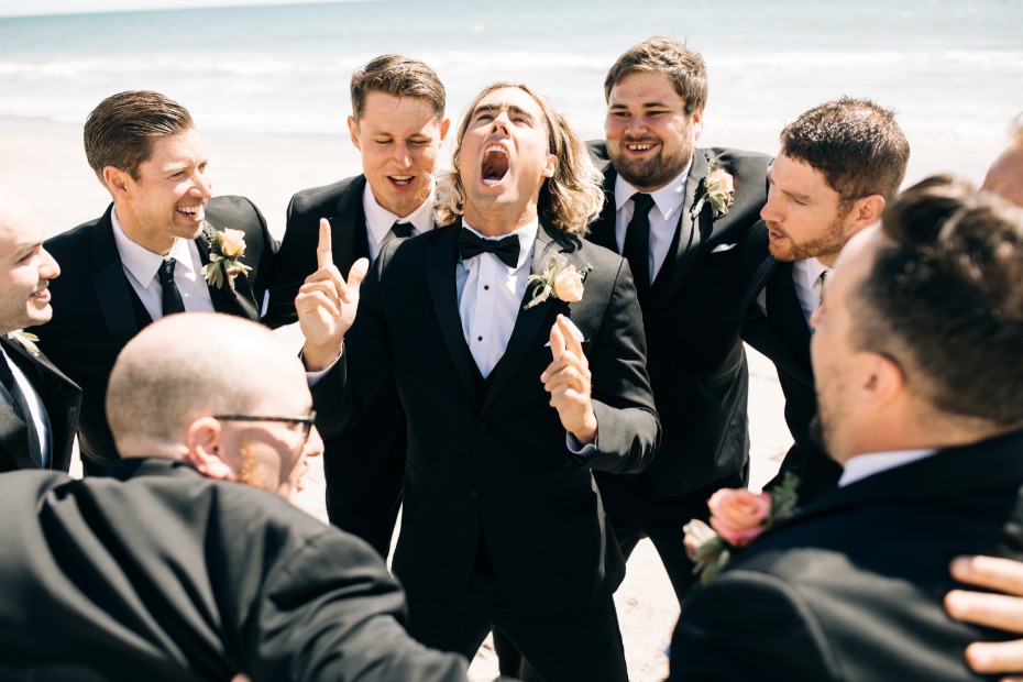 groomsmen getting pumped for the big wedding ceremony