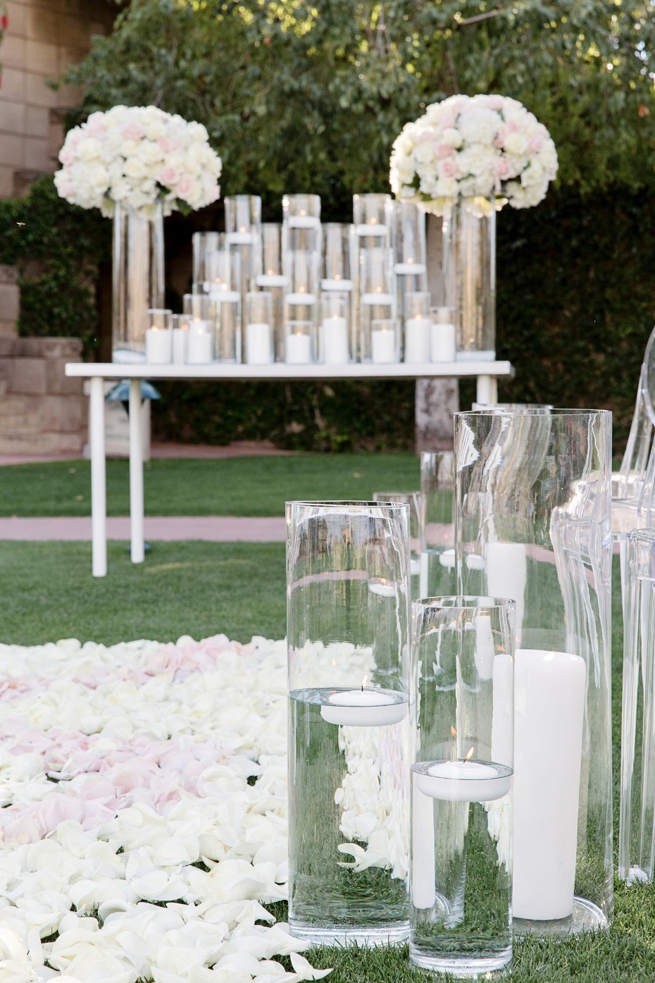 flower petal and floating candle ceremony decor