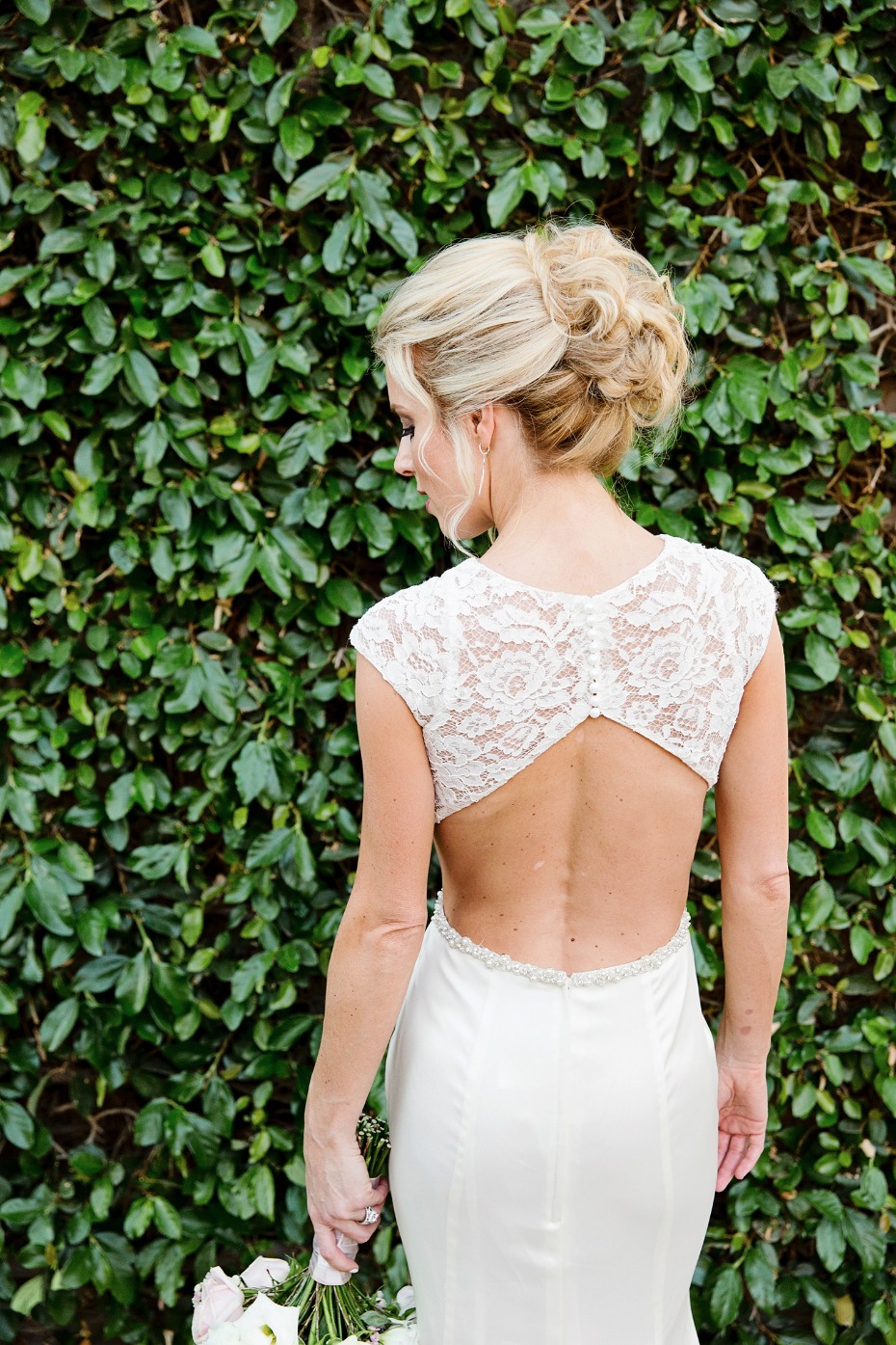 back showcasing wedding dress