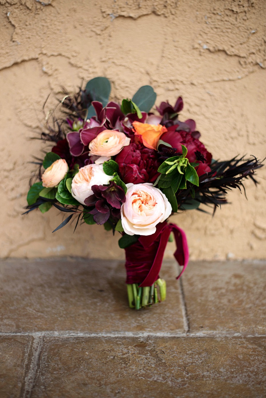 deep red and peach bridal bouquet