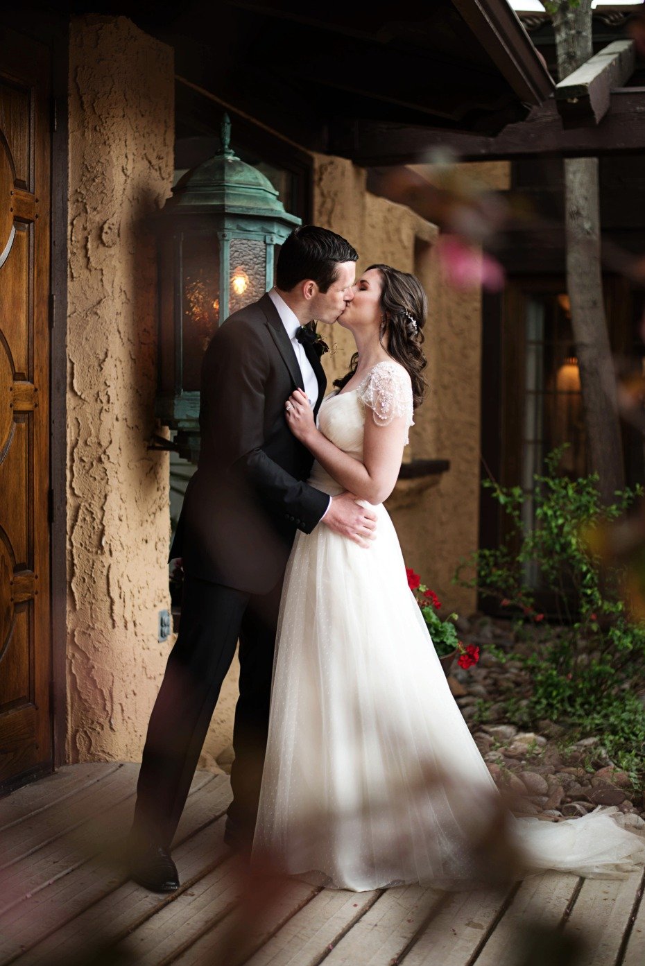 romantic bride and groom wedding kiss