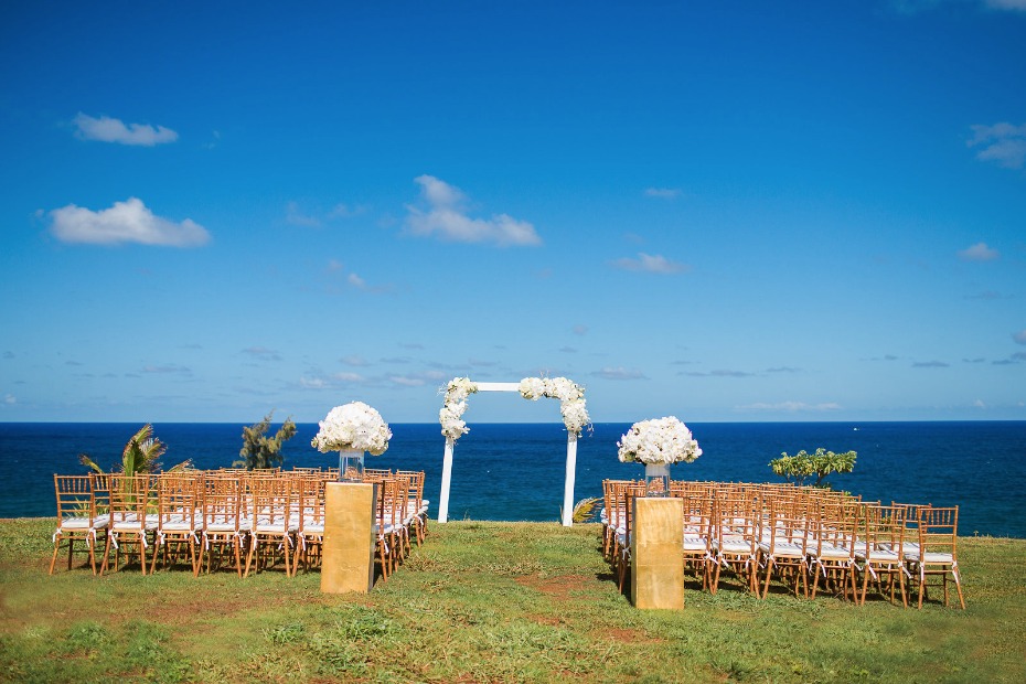 Dreamy gold and white ocean view ceremony