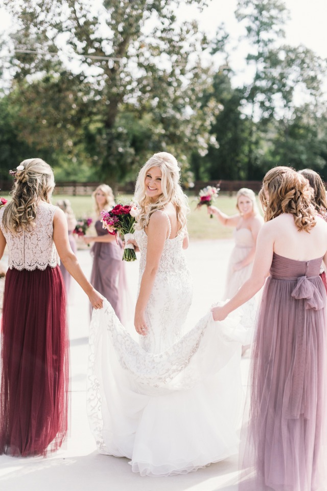 bride and her berry dressed bridesmaids
