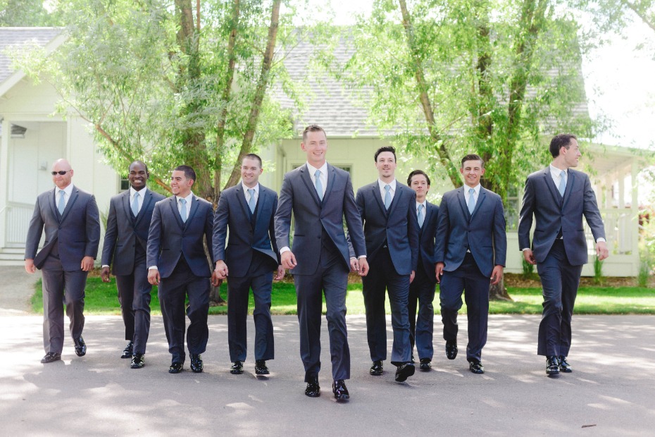 groom and his men in matching charcoal grey suits