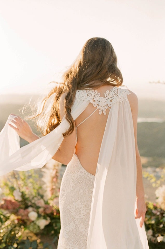 Love the lace detail on the back of this Claire Pettibone wedding gown