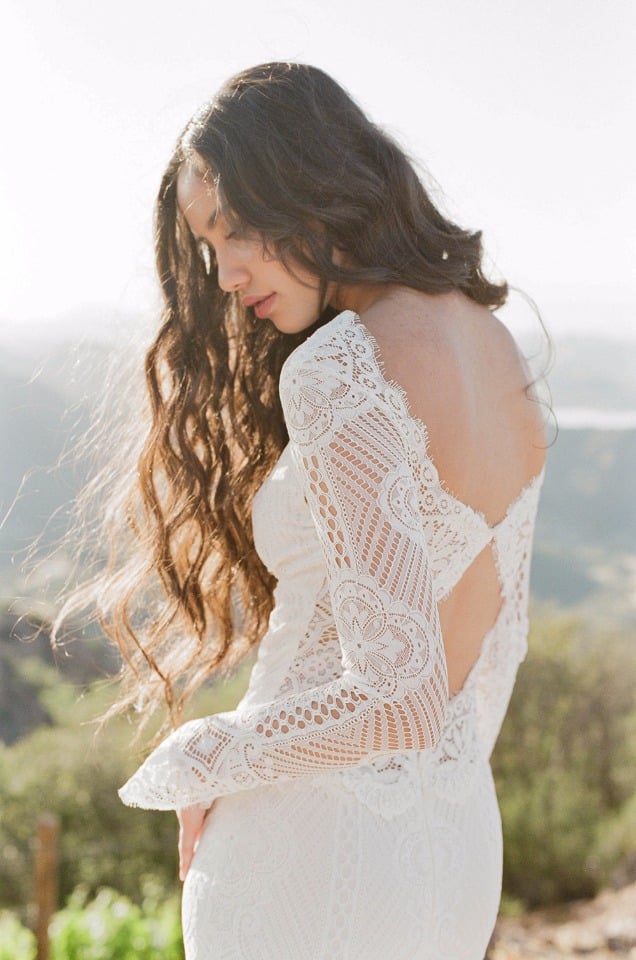 long sleeve lace wedding gown with geometric wedding back