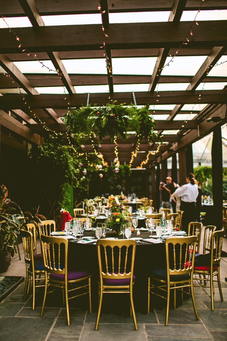 Gorgeous black and gold reception with jewel tones
