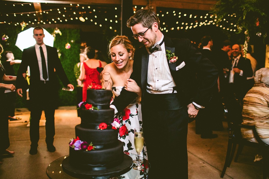 Black wedding cake with colorful flowers