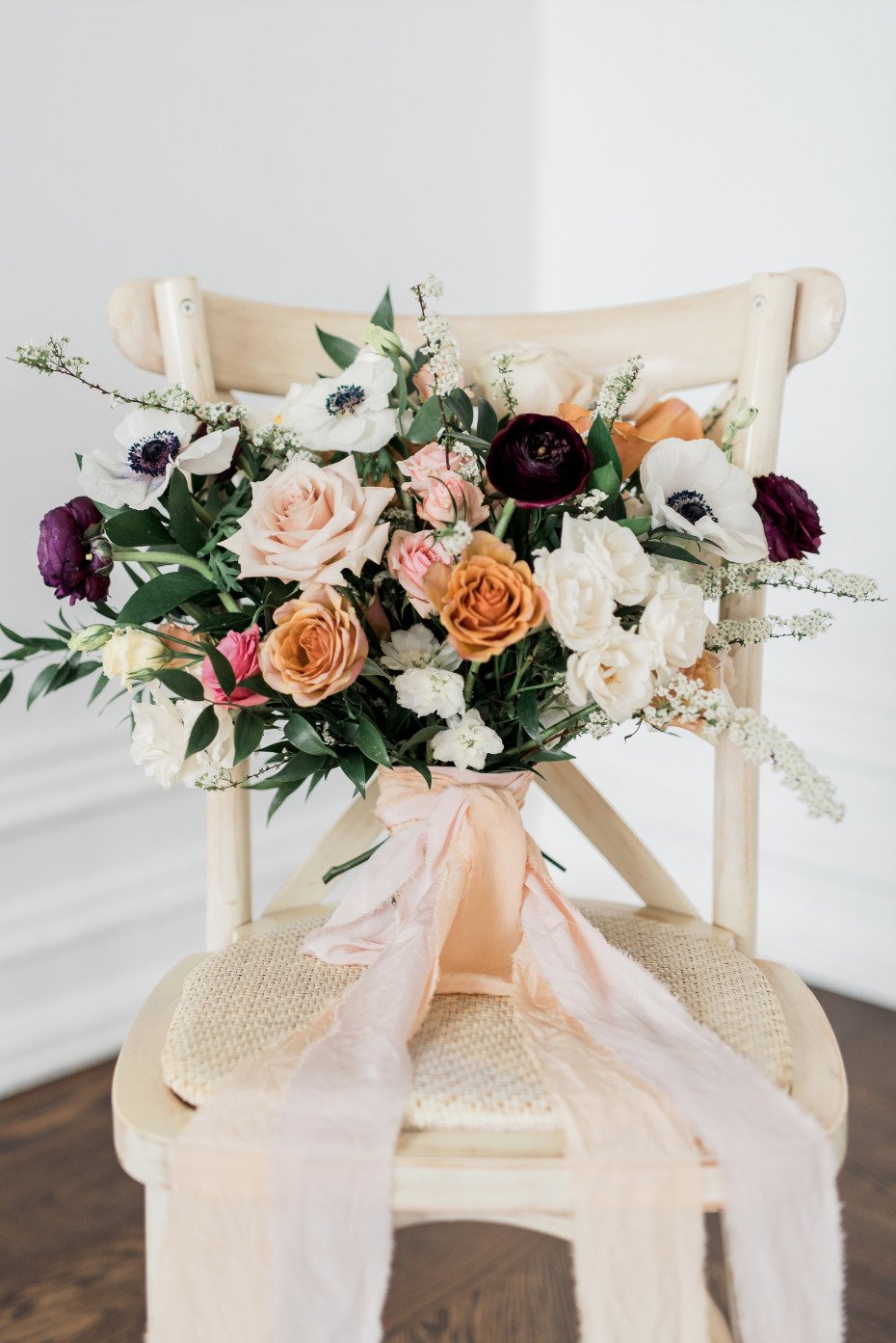 romantic peach and white wedding bouquet