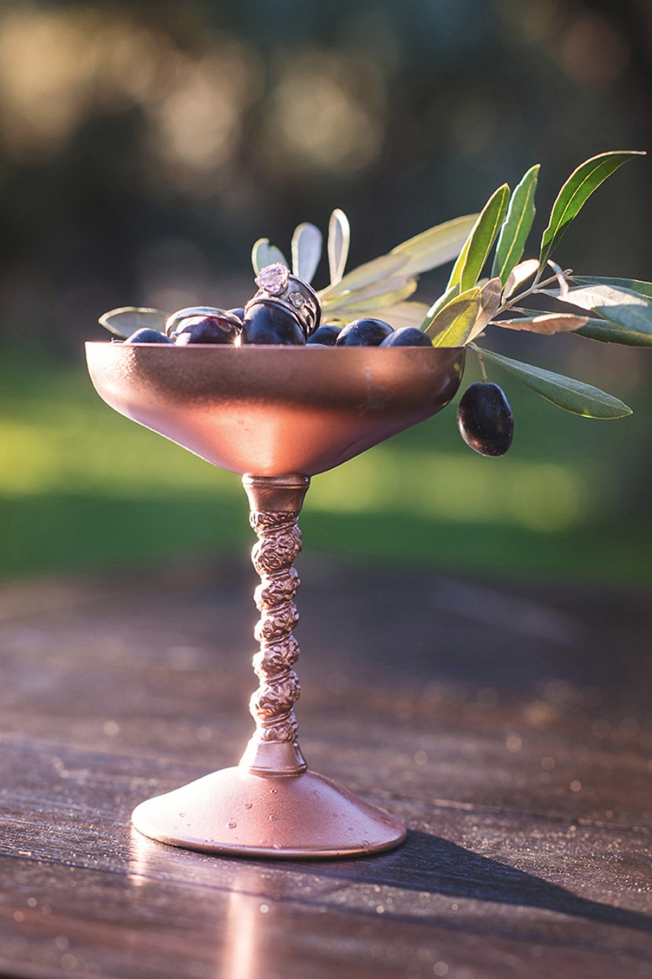 goblet of olives and jewelry