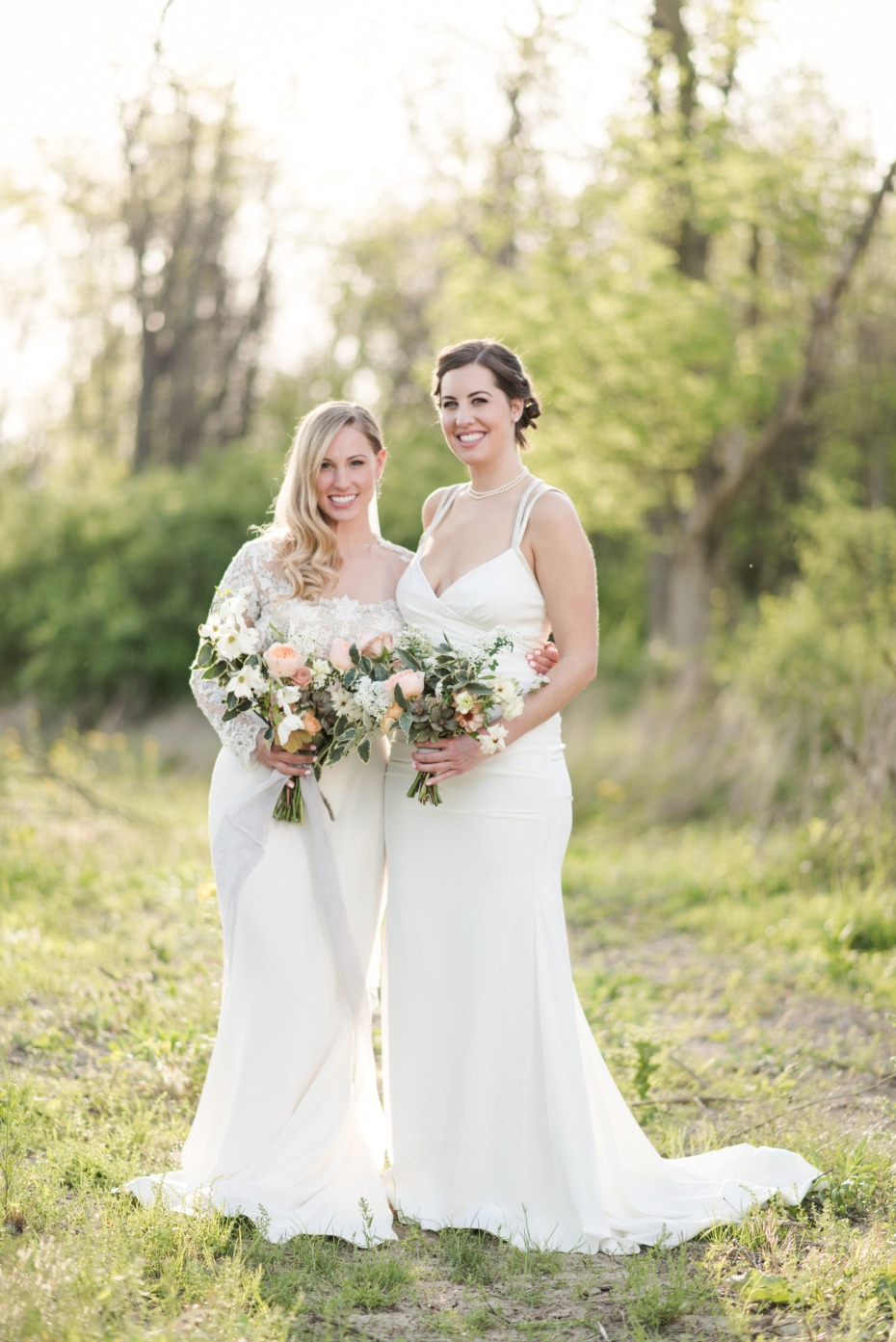bride and bridesmaid in white