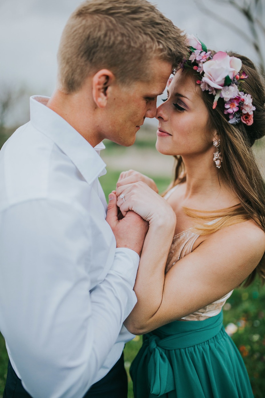 Young couple in love noses touching outdoors