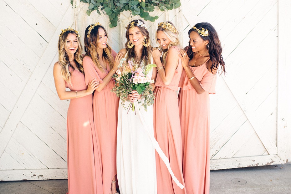boho chic bride in Grace Loves Lace wedding dress paired with Show Me Your Mumu bridesmaid dresses