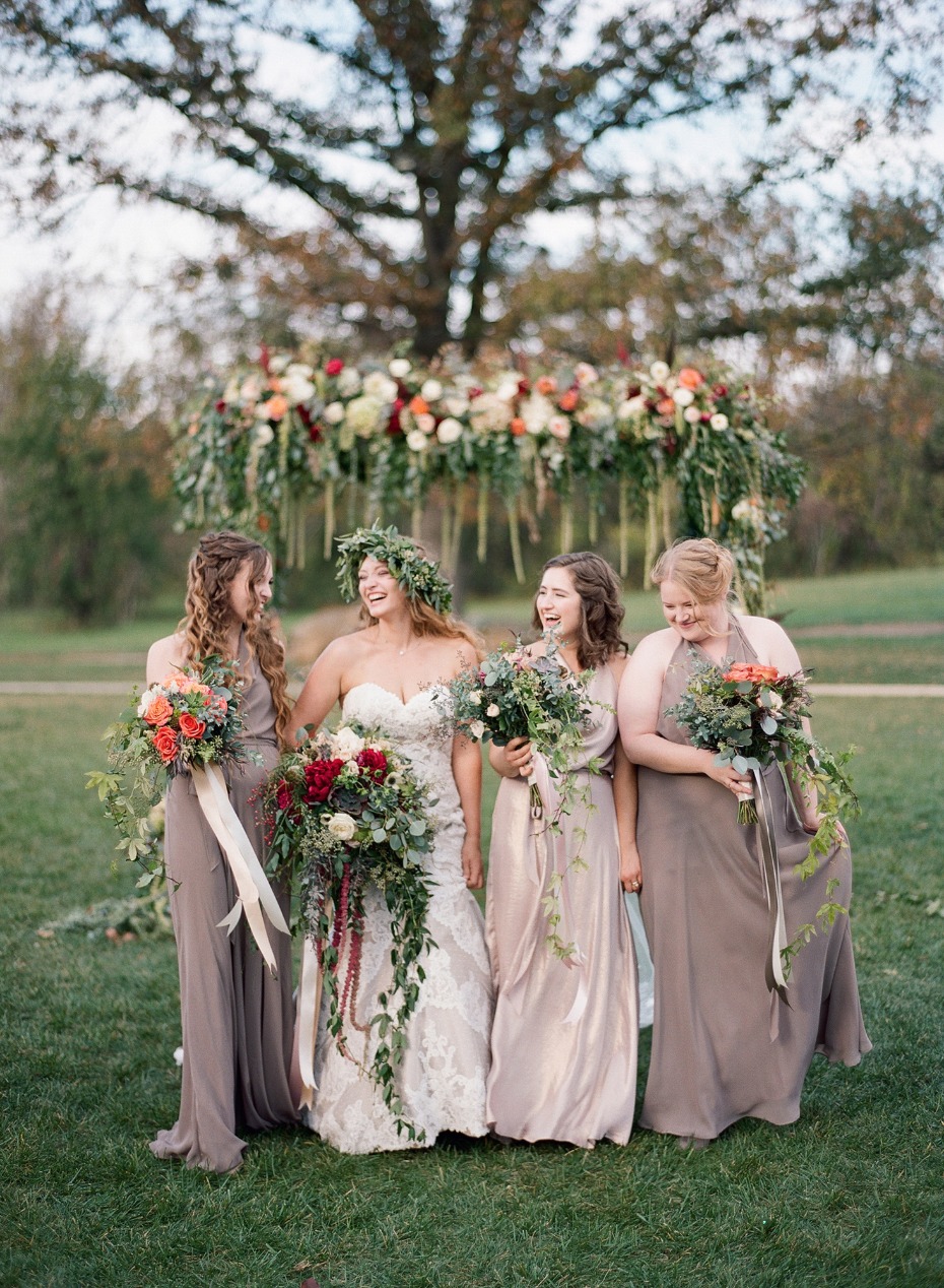 bride and bridesmaids in fall styled dresses