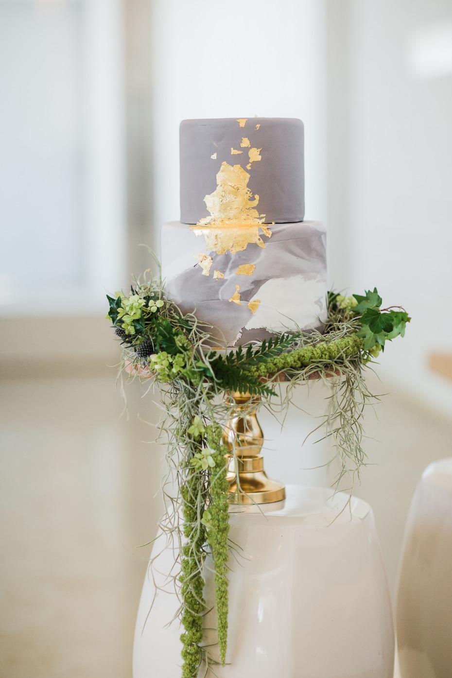 gold leaf and marbled wedding cake