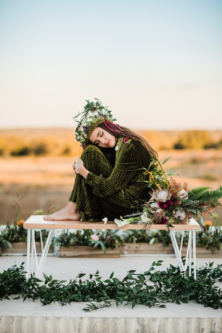 bride in vintage velvet dress and organic headdress