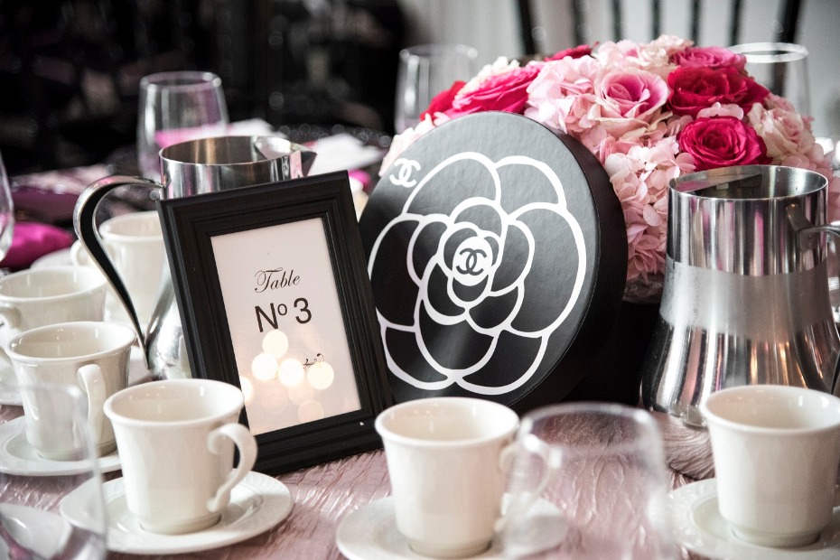 Table setting with Chanel box and flowers centerpiece