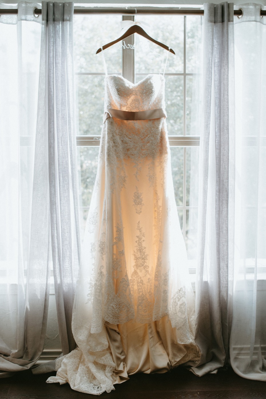 Strapless wedding dress with champagne underlay