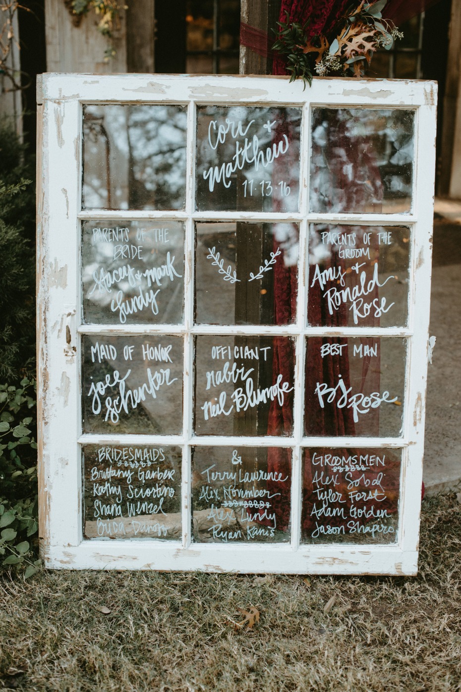 Use a vintage window to introduce your wedding party
