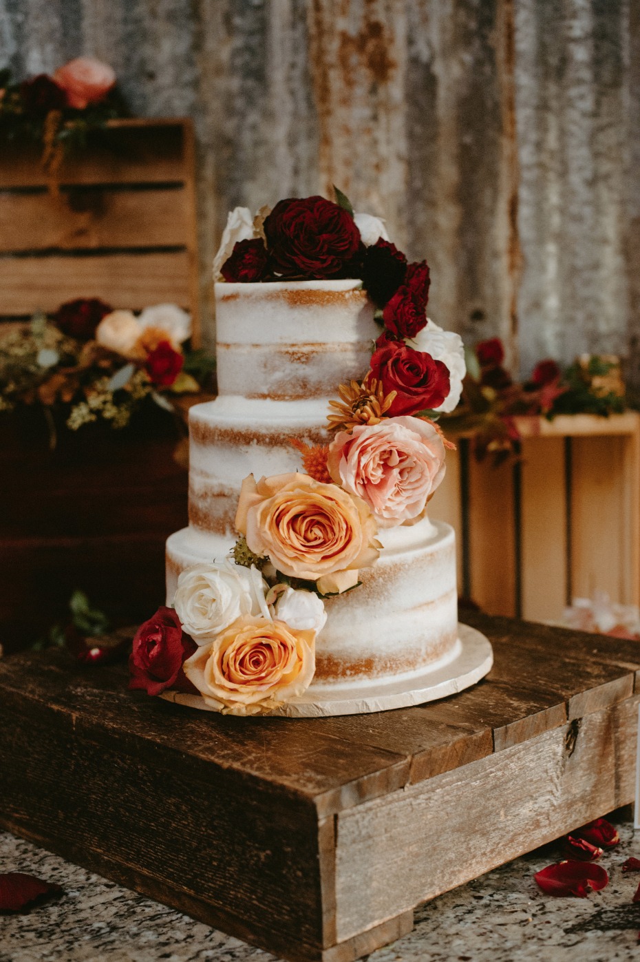 Naked wedding cake with fall florals