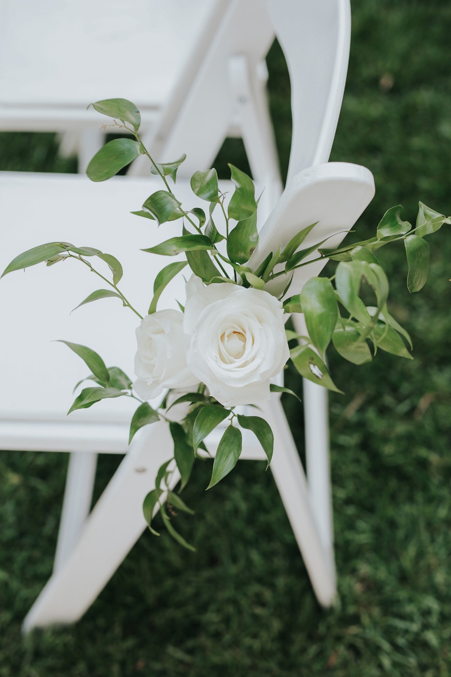 white roses and ivy wedding aisle decor