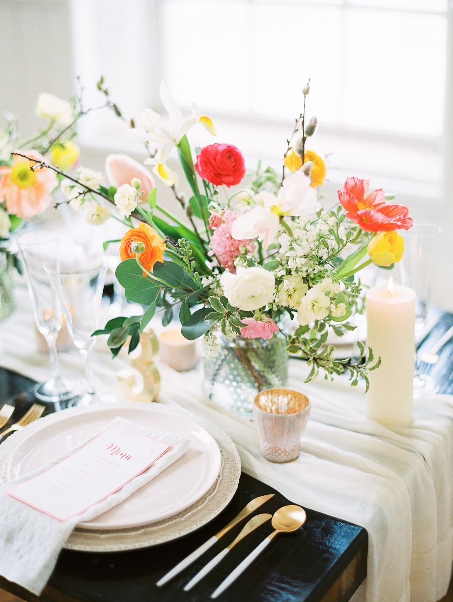 Spring tablescape with gold flatware