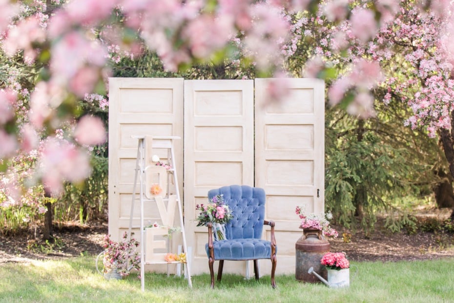 Cute vintage photo booth under the cherry blossoms