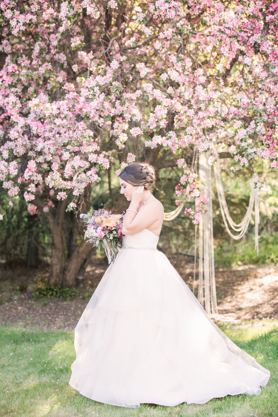 Bridal portrait under the cherry blossoms