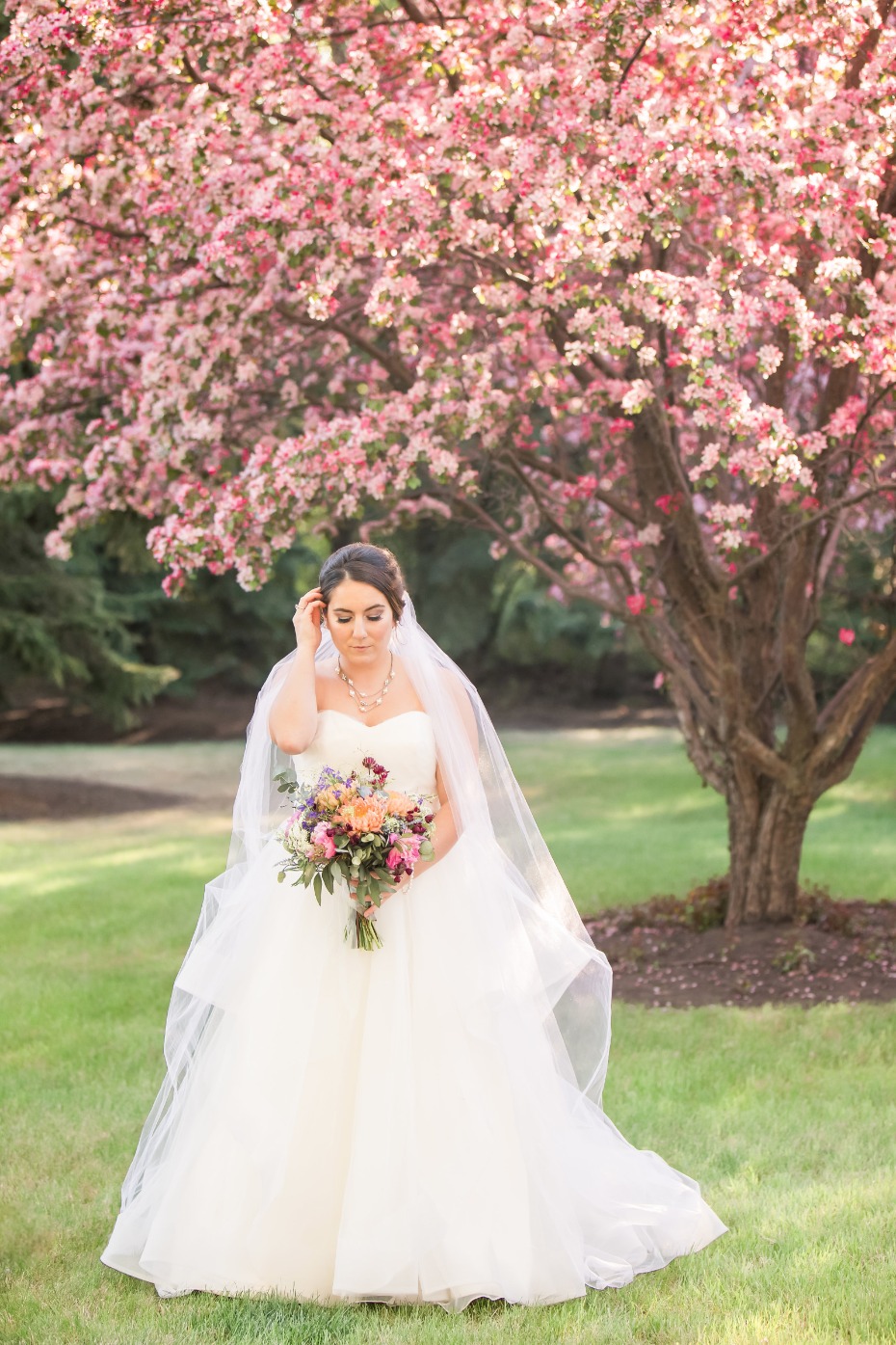 Vintage bride under the cherry blossoms