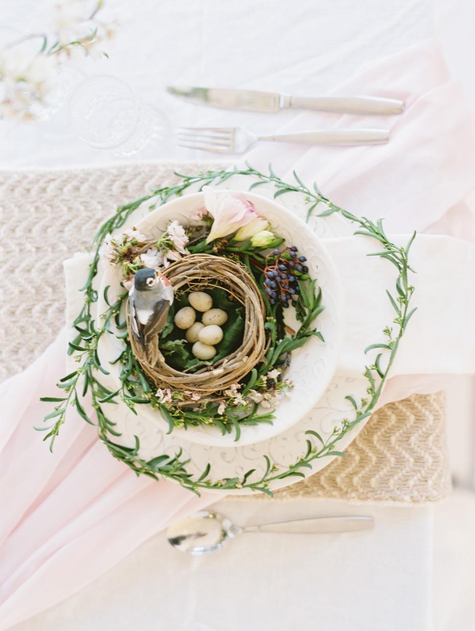 Spring table setting with bird nest