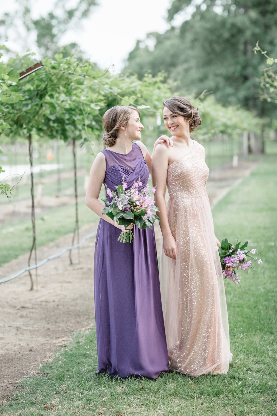 bridesmaids in purple and champagne sparkles