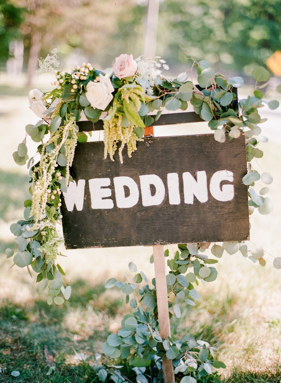wedding sign with flower accents