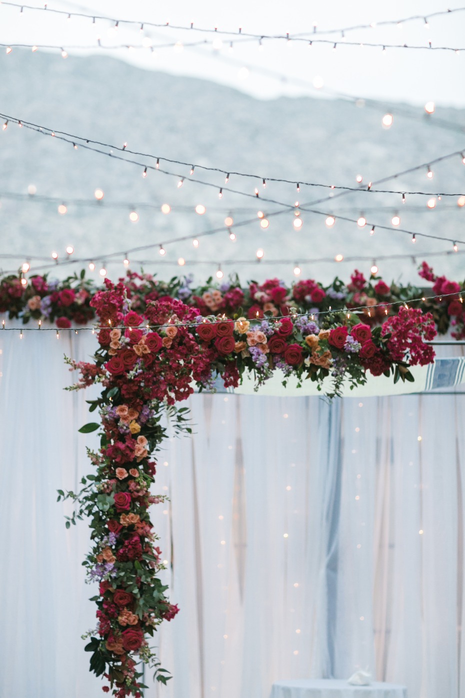 Floral arch with bistro lights