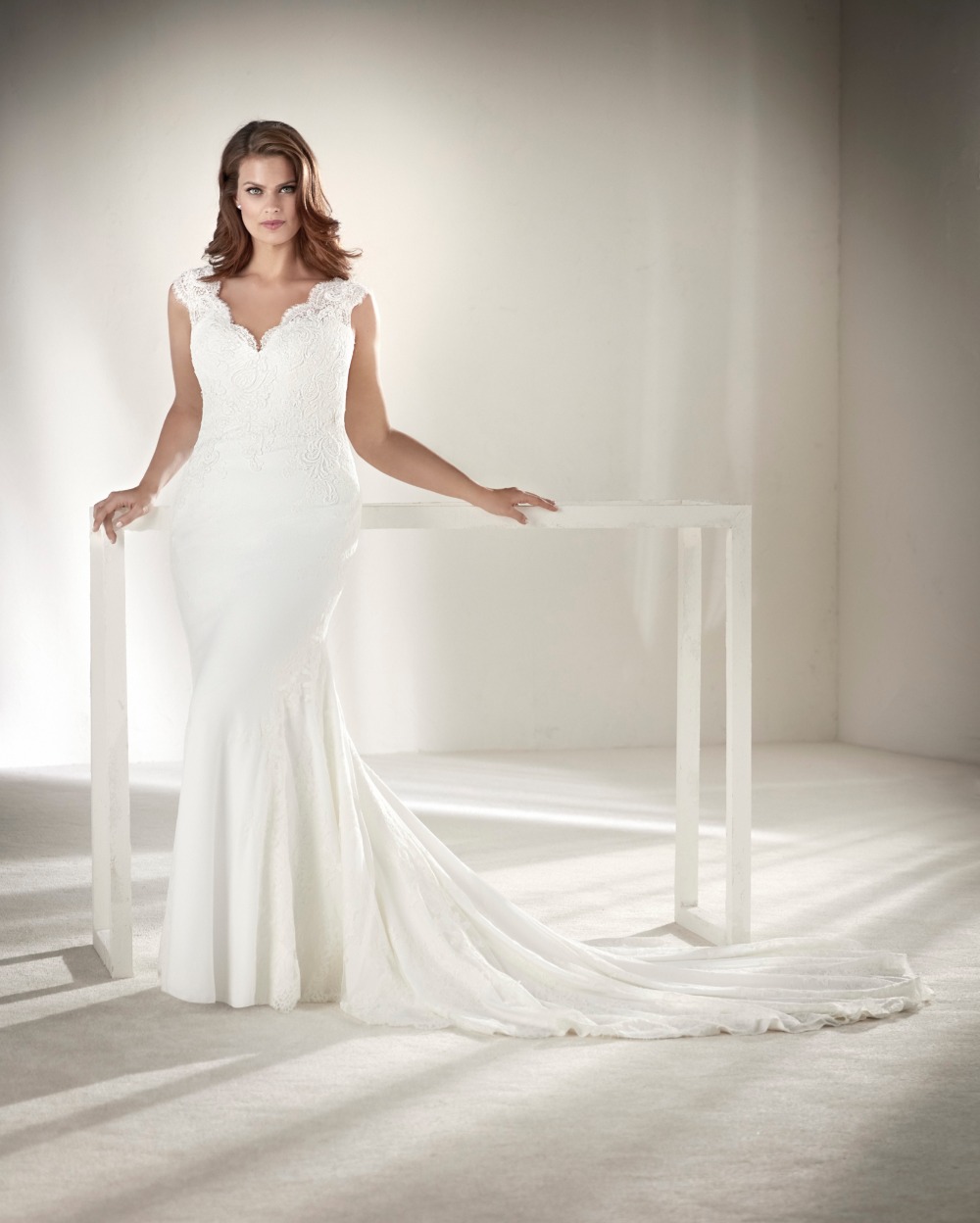 Elegant and modern mermaid plus size wedding gown from Pronovias