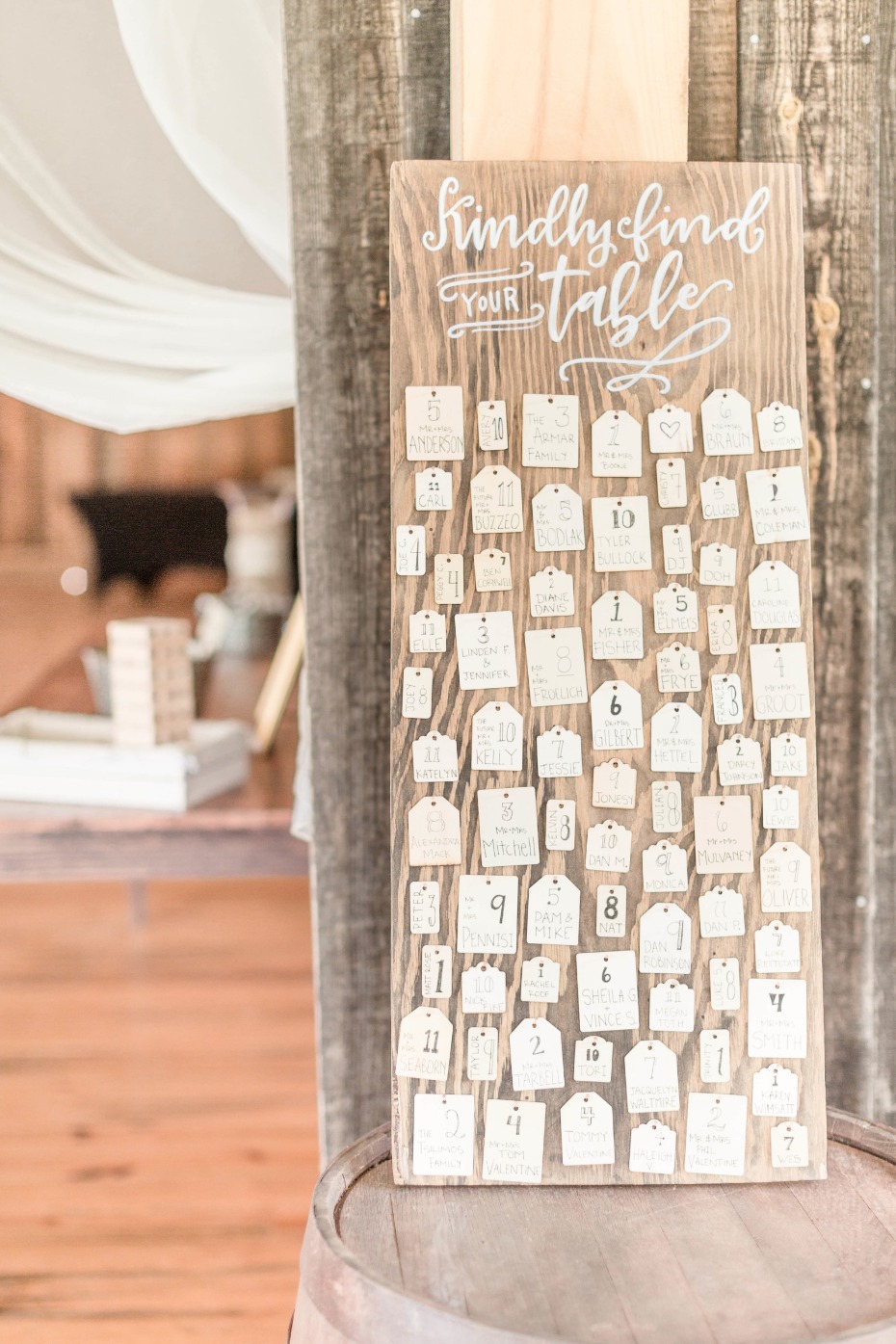hand written seating assignments on mismatched hang tags
